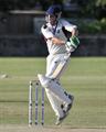 Watsonian's Fleming fends off a short delivery.jpg